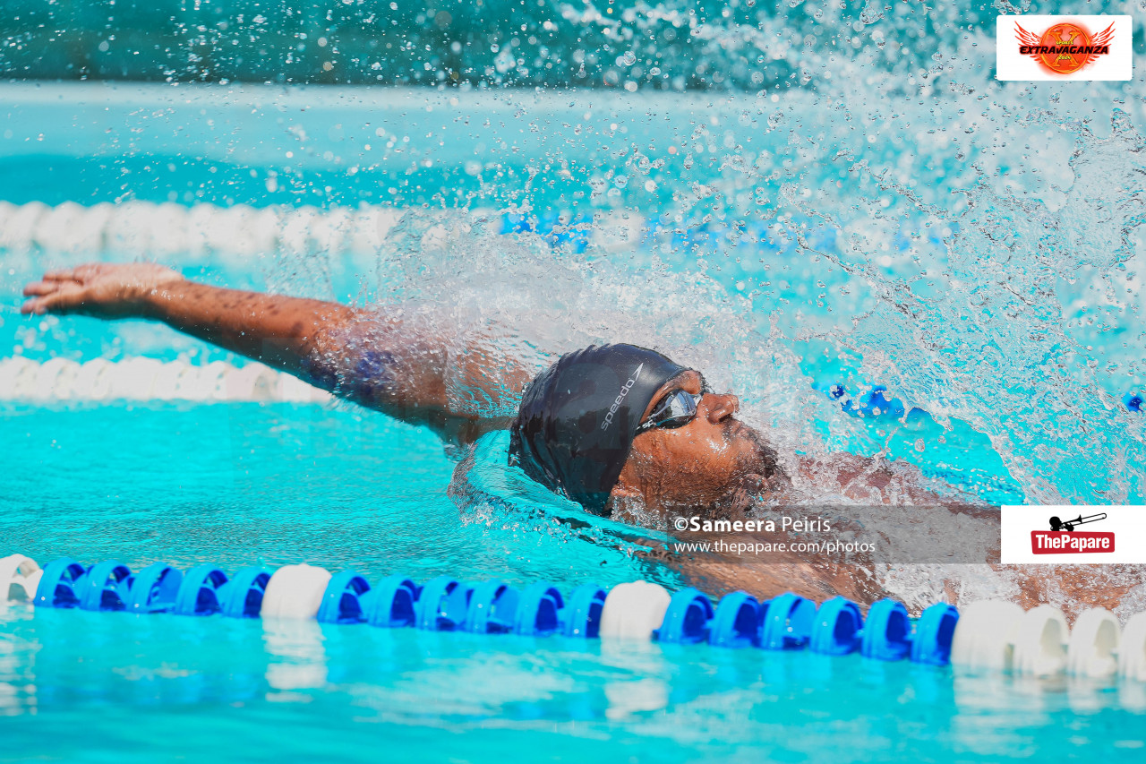 Manula competing in swimming
